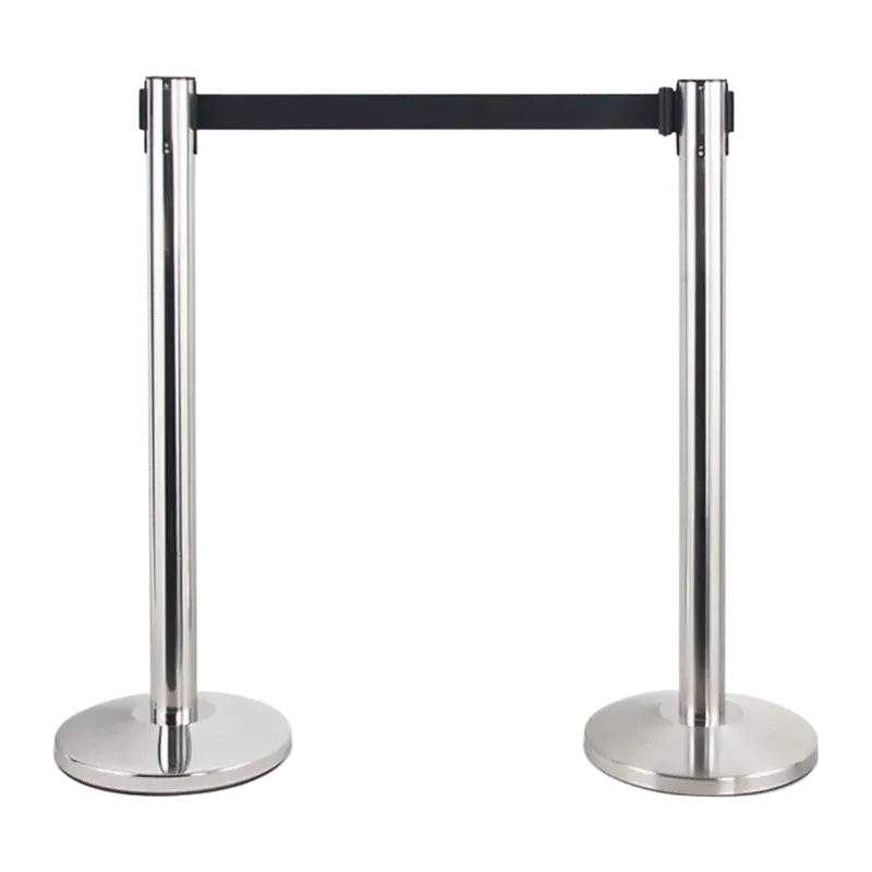 Two polished chrome belt stanchions standing a belt apart, the black retractable belt drawn between them, each on a low tapered base.