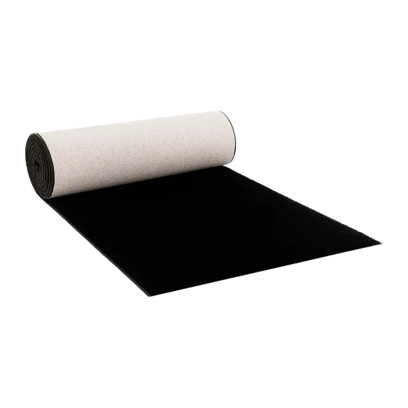 Black carpet runner partly unrolled from the roll, the pale woven backing showing at the coil.