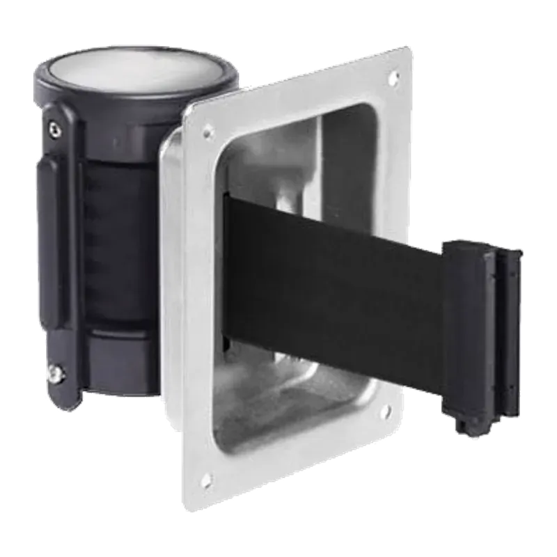 Black belt cassette sitting in a stainless steel wall box, the belt drawn out through the front so the unit finishes flush with the wall.