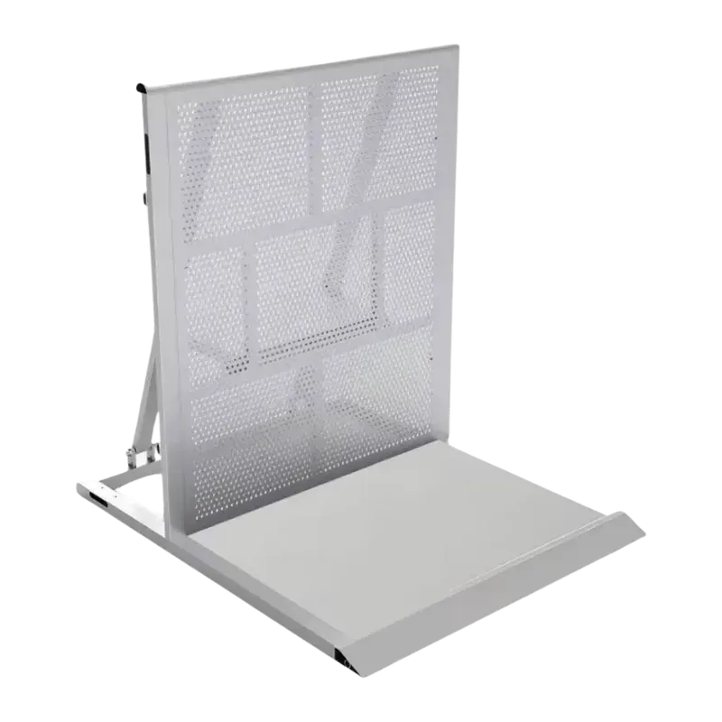 Aluminium stage barrier section seen from the front: a perforated panel held on a braced frame, with the flat base plate lying out along the floor in front of it.