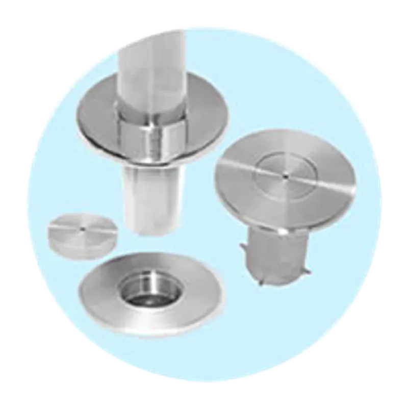 Floor socket shown in parts — the sunken cup, the post spigot and the flush cap that closes it.